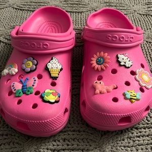 Women’s Pink Crocs. Size 8. Comes with Jibbitz. Excellent Condition.